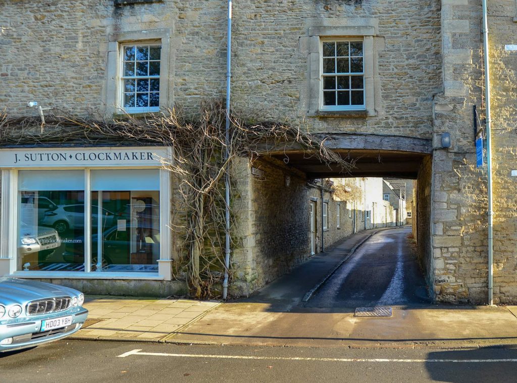 Clockmaker and Croft arch Fairford